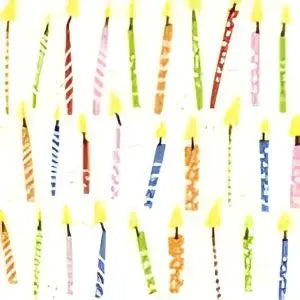 Colourful birthday candles on a white background